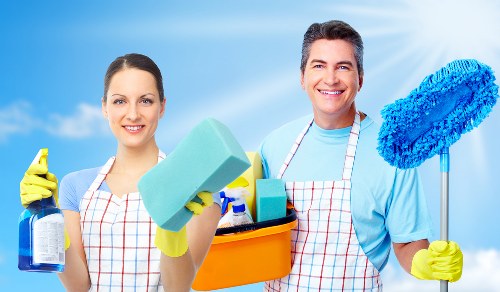 Professional mattress cleaning equipment on a bed